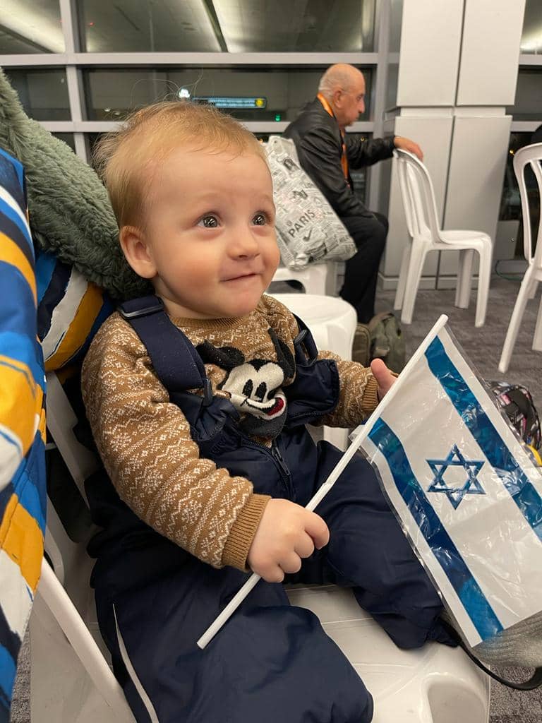 A smile that says it all after arriving in Israel.
